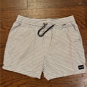 Hurley Men’s  Gray and White Striped Shorts size Large in great condition.